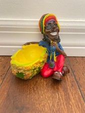Rasta Jamaican Man Holding