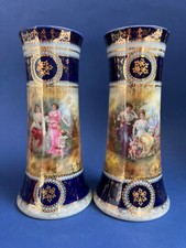 Paire de vases rouleau 1900 en porcelaine de Vienne