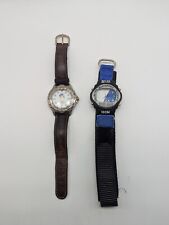 Lot 2 montres publicitaires Nike et Nike Air, date, lunette tournante