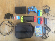 Nintendo Switch avec dock + câble HDMI et chargeur + 1 manette Pro + 1 jeu + sac