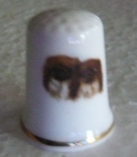 Dé à coudre de collection en porcelaine décoré d'un couple de Pékinois