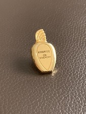 Pin parfum amarige - pin's,