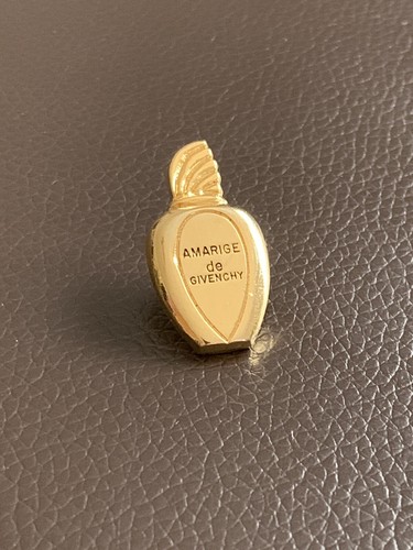 Pin parfum amarige de - pin's,