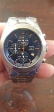 MONTRE QUICKSILVER VINTAGE ACIER UNE DIZAINE D EXEMPLAIRE RARE SURF SURFEUR BE