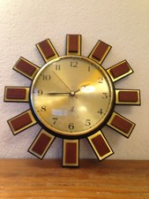 superbe Horloge pendule soleil bois et métal doré  JAZ Vintage An 50's 60's