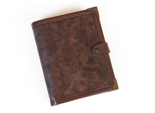 Brown planner binder ring - /,