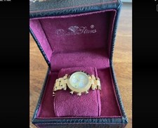 Vends montre DiamStars femme , luxe , excellent état .