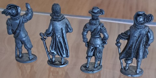 Figurines métal - en,