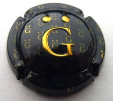 Capsule de champagne GIRAUD Henri n°18 Estampée bleu-noir et or