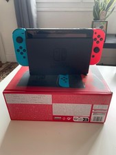 Nintendo Switch 32 Go Console Portable avec Manettes Joy-Con Bleu Néon/Rouge...