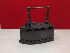 Fer à repasser charbon en