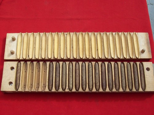 Ancien pressoir moule a - moule,