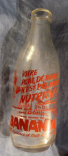 BANANIA : ANCIENNE BOUTEILLE DE LA COOPÉRATIVE LAITIÈRE DE NÉBOUZAT