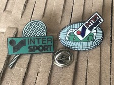 pins INTERSPORT egf signé MVS. equipement sport marque SUISSE