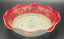 Coupe Limoges Marcel Chaufriasse, porcelaine décor or et carmin, signée