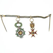 Deux médailles miniatures sur