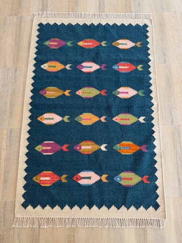 Tapis laine poisson - en,