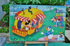 Boîte de 2 puzzles →   2 x 48 pièces →  SCHMIDT/ DISNEY PARADE