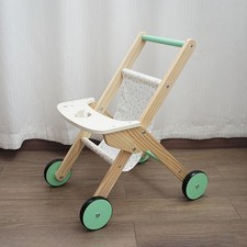 Poussette de poupée, maison