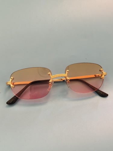 Paire lunettes soleil - de, de