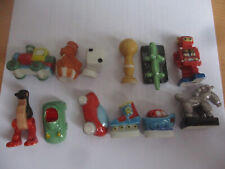 LOT 12 fèves série jouets ballon cheval crocodile train voiture dé patin bateau