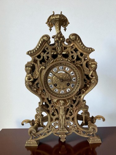 Pendule bronze rocaille - , décor