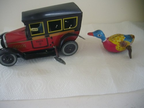 Jouet ancien mecanique en - ,