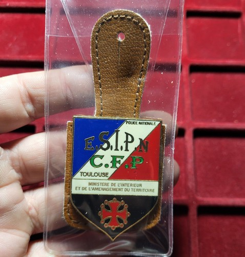128 pucelle insigne - ~,