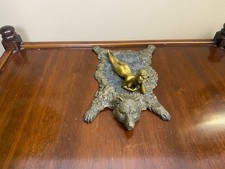 Sculpture bronze femme sur - en,