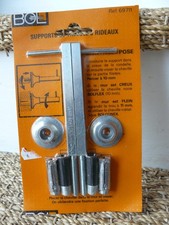 Support de tringles à rideaux métal (murs creux ou pleins)