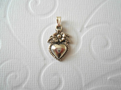 Pendentif argenté motif - 1,