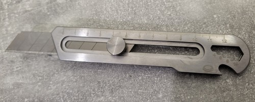 Cutter multi fonction inox - cutter,