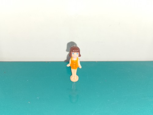 Polly pocket figurine doll
