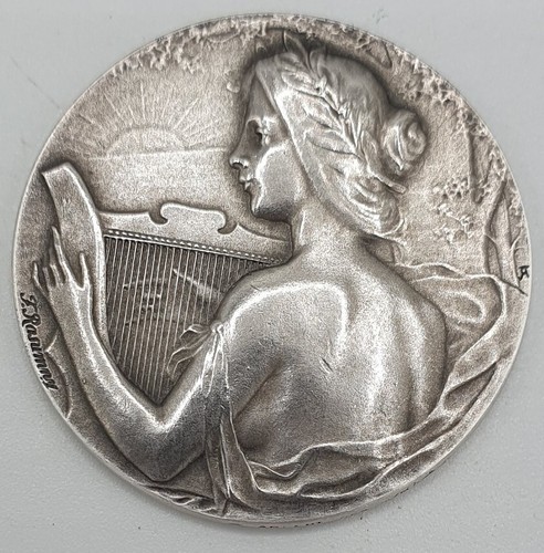 Médaille femme a - :,