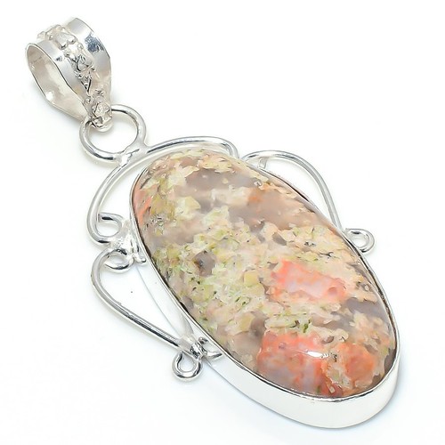 Pendentif bijou ancien fait