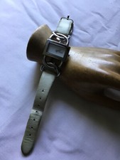 Ancienne montre DOLCE & GABBANA argenté pile et bracelet à changer.