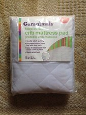 Garanimals fitted quilted crib mattress pad with wrap around skirt 