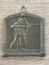 ancienne plaque en bronze