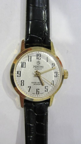 Montre mécanique vintage - montre,