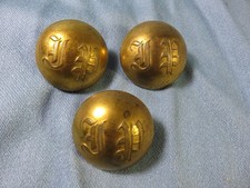 3 Boutons de livrée laiton