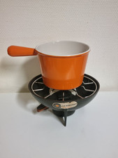 LE CREUSET SERVICE A FONDUE POÊLON COULEUR ORANGE ET SUPPORT EN FONTE 