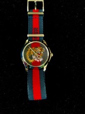 Montre Gucci  le marché des merveilles  "wild cat"