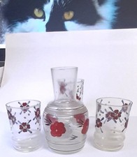 BOUTEILLE ET TROIS VASES