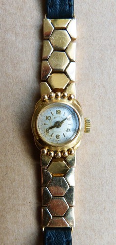 Montre femme divine - en, or