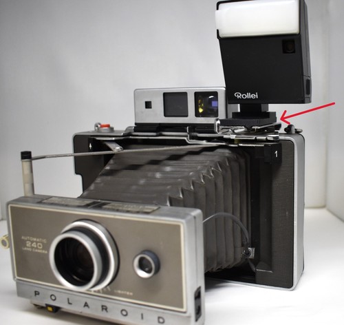 Polaroid flash bracket cold