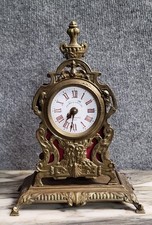 Réveil en bronze figurant un cartel Louis XV époque milieu XXeme siécle