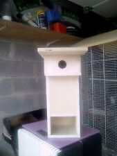 nid mesange bleue en bois