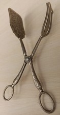 Belle pince à gâteau