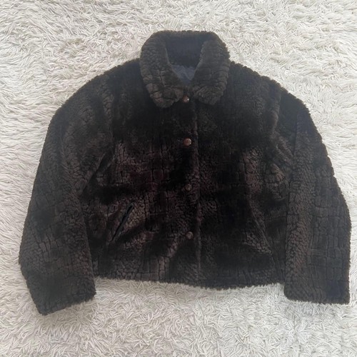 Manteau court réversible ours