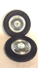 LOT DE DEUX ROUES DE VOITURE A PEDALE  .